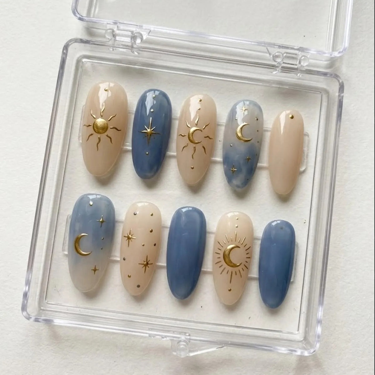 Celestial Press On Nails, Blue Nude Sun Moon & Gold Star Almond Nails