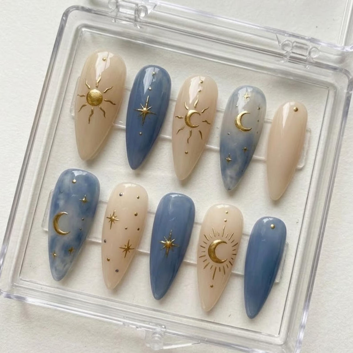 Celestial Press On Nails, Blue Nude Sun Moon & Gold Star Almond Nails